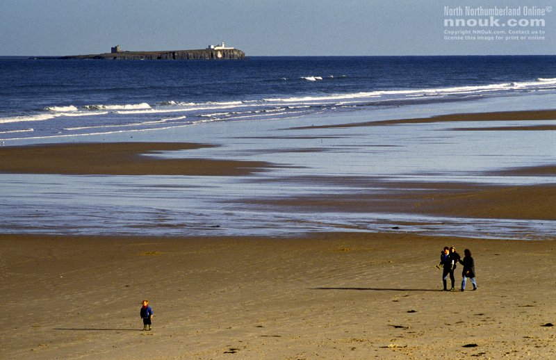 The beach near Bamburgh with the Farne Islands in the distance