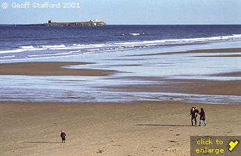 Beach north of Seahouses, showing the Farne Islands