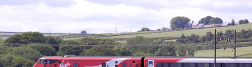 A southbound Virgin train crosses the Royal Border Bridge at Berwick