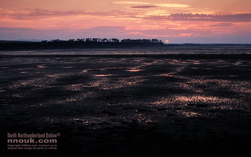 A sunset over Budle Bay, Northumberland