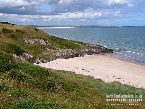 The beach at Bamburgh beyond the golf club