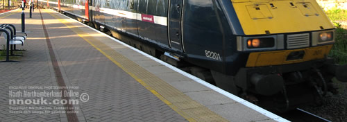 A train heading south at Berwick upon Tweed station